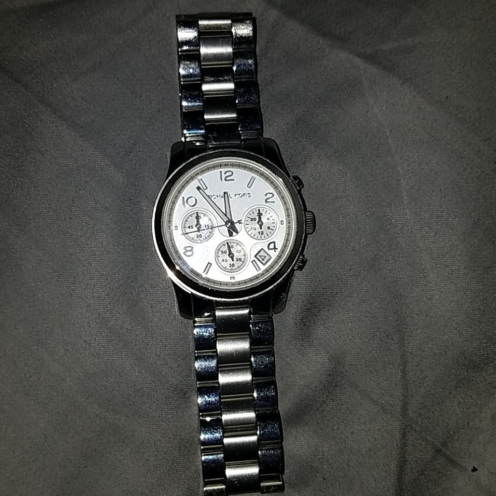 Michael kors watch used needs new battery